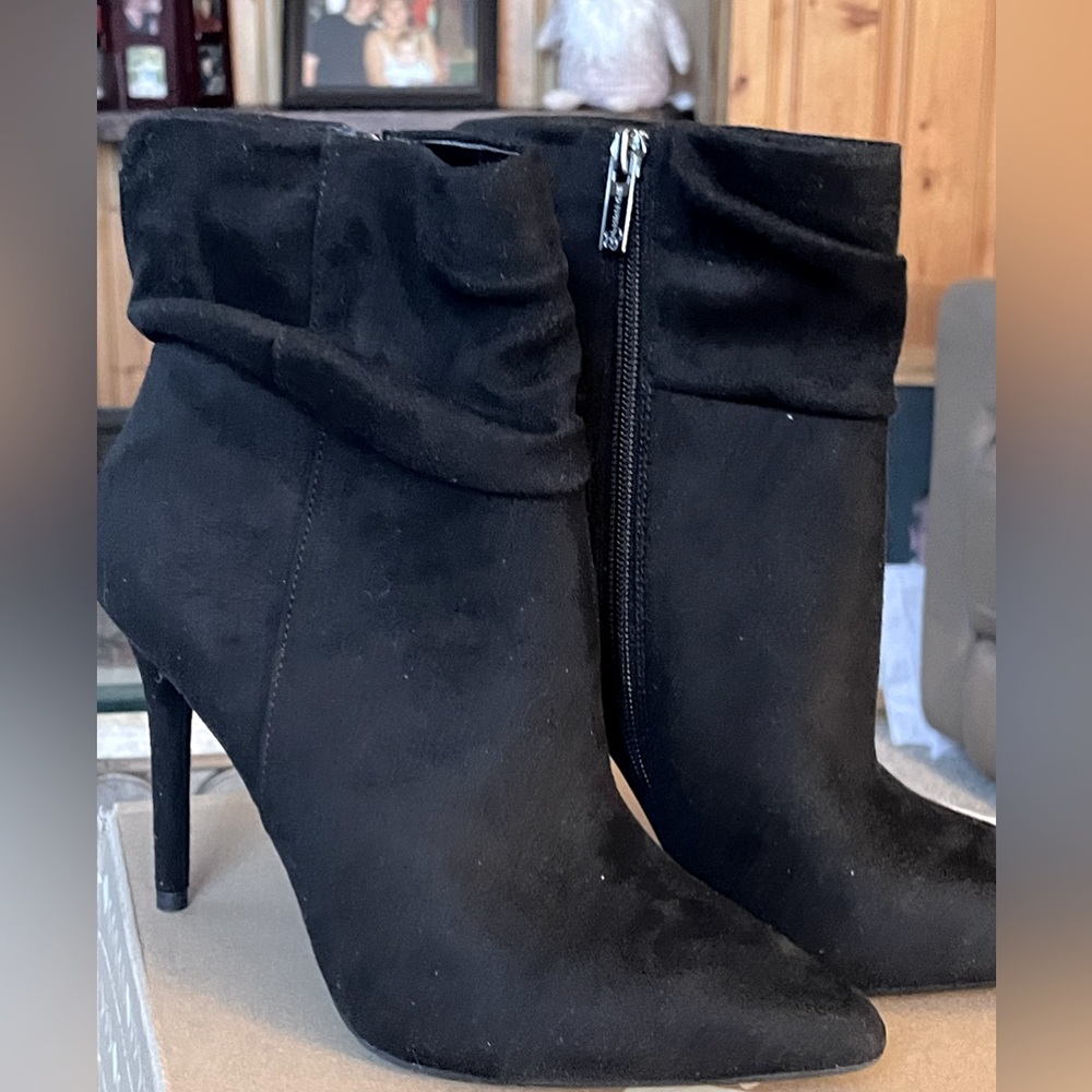 Heels, heels, heels, beautiful black high heel ankle boot. Size 8 1/2